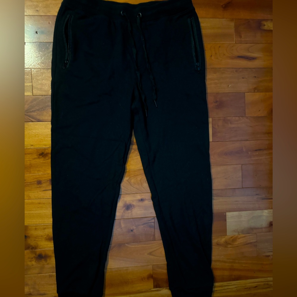 BLACKOUT SWEATPANTS WITH ZIPPER UP POCKET